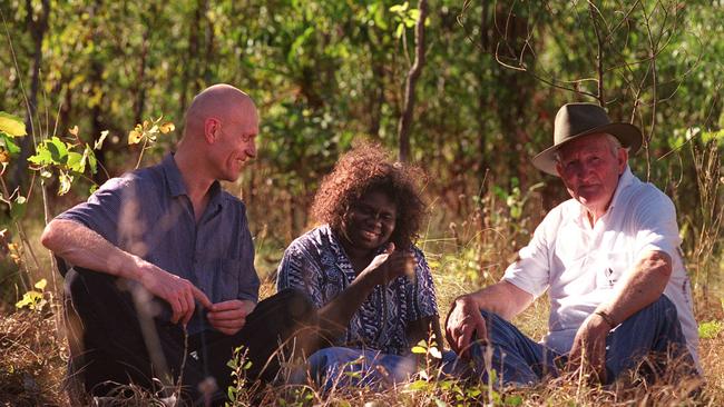 Midnight Oil lead singer Peter Garrett, Jabiluka site traditional owner Yvonne Margarula and former Labor MP Tom Uren take break during the 1998 protest march.