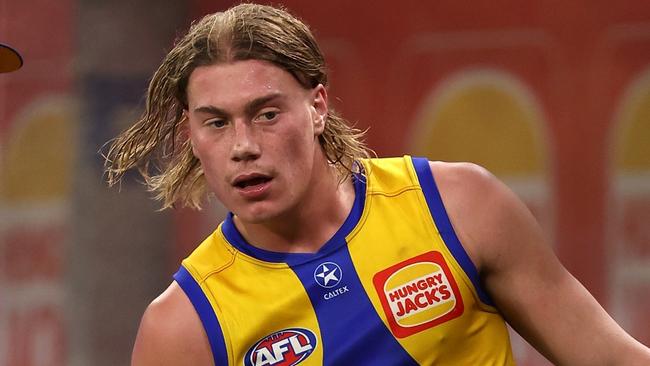 PERTH, AUSTRALIA - MAY 04: Harley Reid of the Eagles holds his right hamstring after coming from the field for treatment during the round eight AFL match between West Coast Eagles and Essendon Bombers at Optus Stadium, on May 04, 2024, in Perth, Australia. (Photo by Paul Kane/Getty Images)