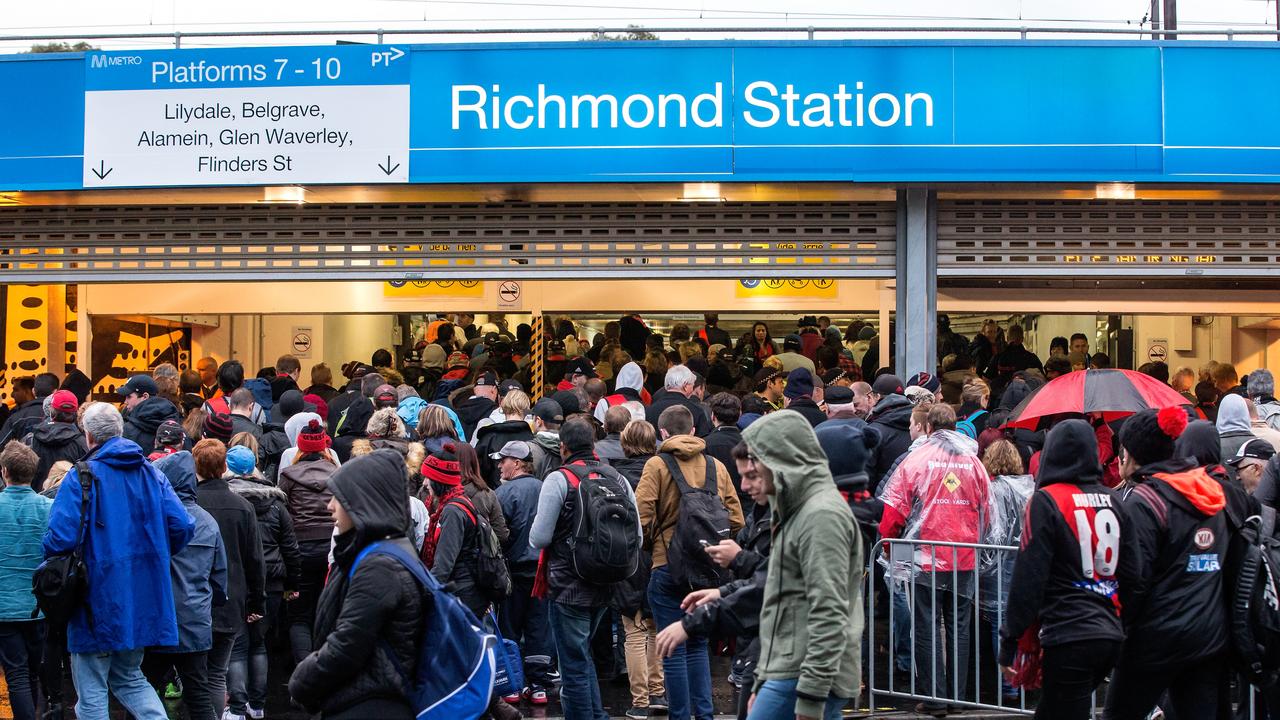 Footy fans pile into Richmond station after an Anzac Day clash.