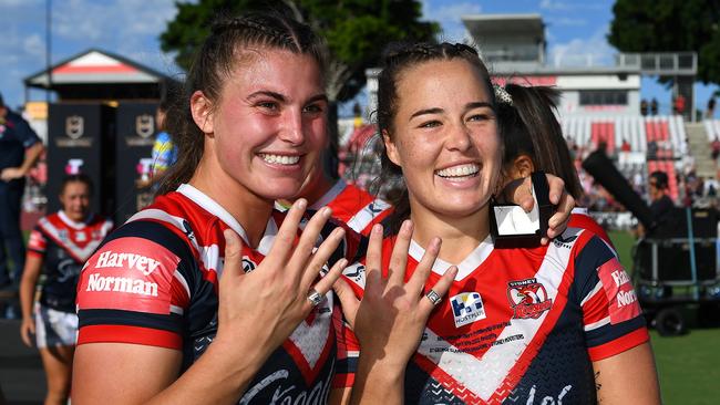 Jessica Sergis and Isabelle Kelly show off their premiership rings.