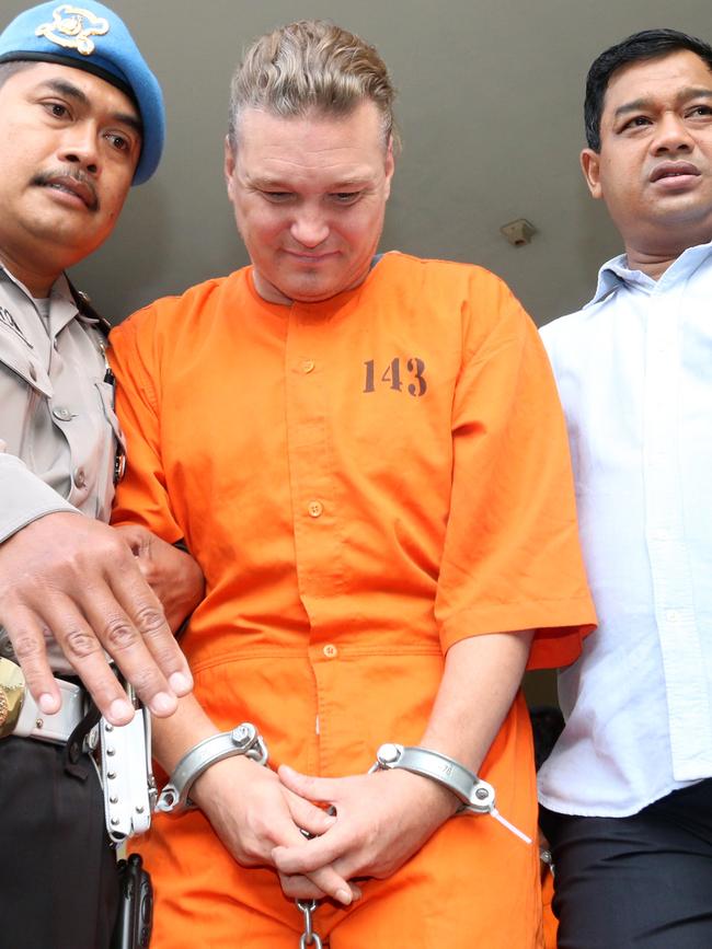 David Van Iersel, 38, is escorted by Denpasar Police to parade with other drug suspects during a press conference on Tuesday. Picture: AAP Image/Lukman S. Bintoro