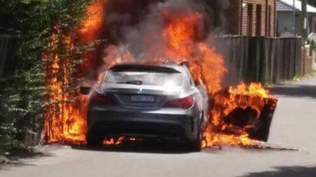 A car on fire in Chandler St, Kogarah, believed to be involved in the Mick Hawi  shooting. Picture: Claude Nunes