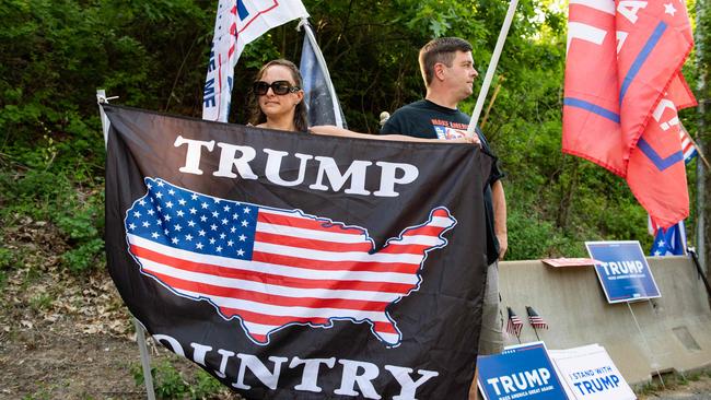 Trump supporters before a campaign event for presidential hopeful Ron DeSanti in New Hampshire. Picture: AFP.