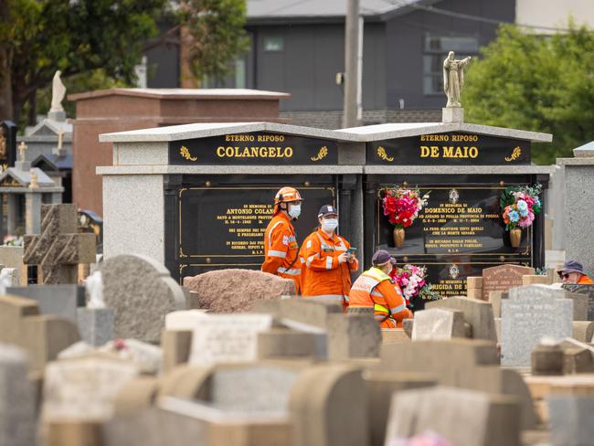 Police, detectives and forensics examining Footscray General Cemetery. Picture: Jason Edwards