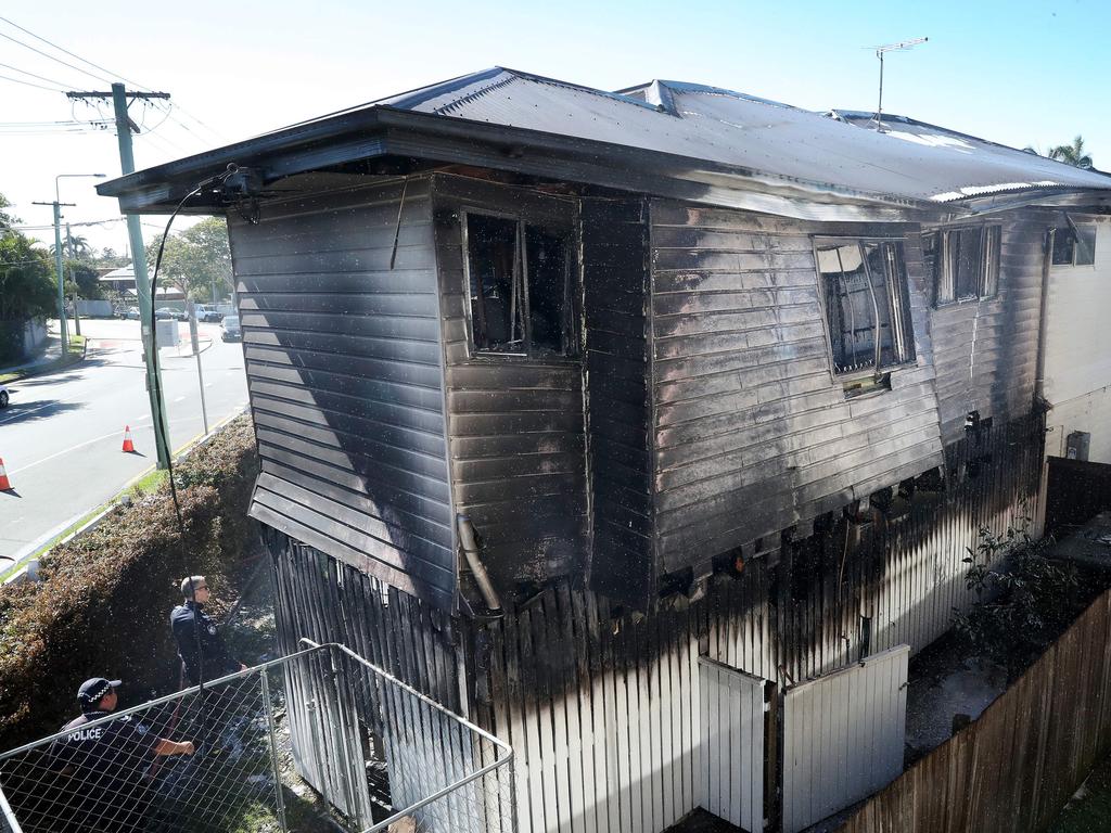 Fire and Police at the scene of the house fire in Everleigh Street, Wooloowin. Photographer: Liam Kidston.