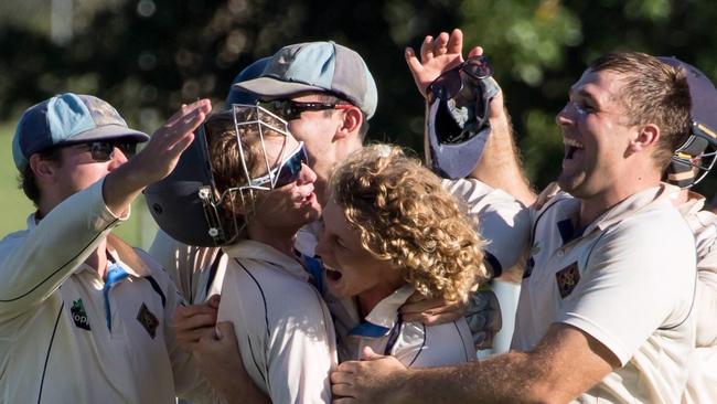 Northern Suburbs celebrate beating Redlands in a thrilling finish to a Premier Grade cricket match in Brisbane. Picture: Ian Bartlett