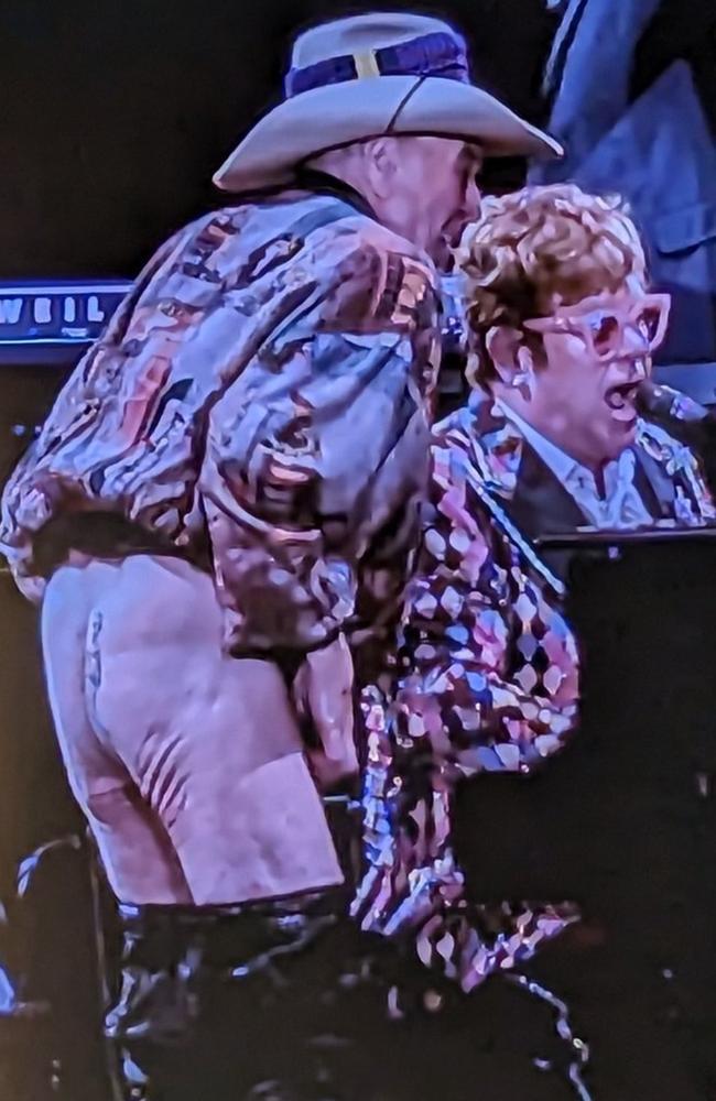 The Aussie presenter left the crowd stunned whenhe dropped his pants on stage at an Elton John concert.