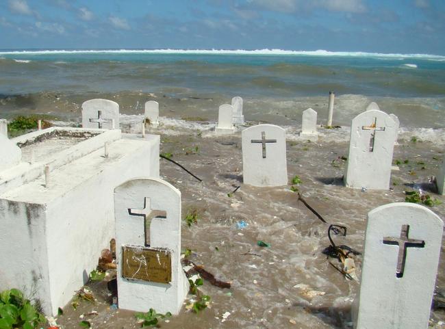 A cemetery on the shoreline in Majuro Atoll is flooded from high tides and ocean surges in the low-lying Marshall Islands, a Pacific atoll chain that rises barely a metre above sea level