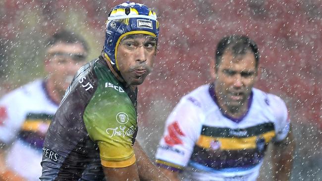 Johnathan Thurston of the Cowboys looks to pass.
