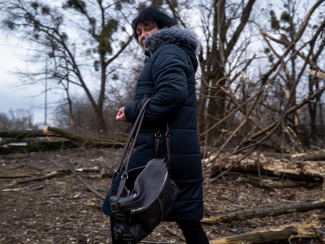 A woman walks among the damage after Russia unleashed a missile attack on Ukraine. Picture: Getty Images