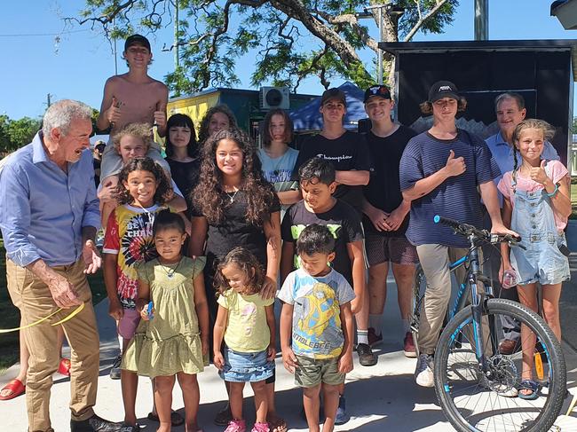 Maisie Monaghan helps Clarence MP Chris Gulaptis cut the ribbon to officially open the relocated youth hubs while being watched on by some excited Clarence Valley youth and Clarence Valley Mayor Jim Simmons.