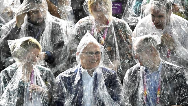 Malcolm Turnbull braves the elements in the stands. Picture: Getty Images