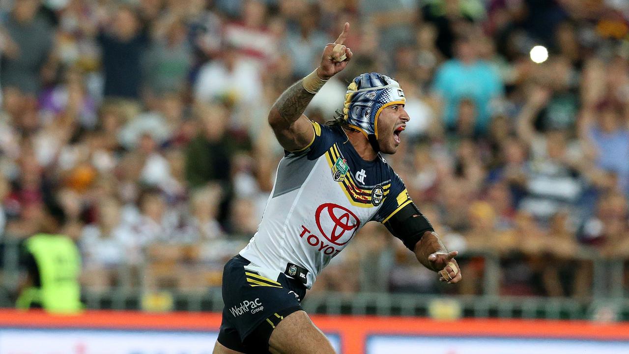 Johnathan Thurston kisck a field goal to win the 2015 NRL Grand Final between the Brisbane Broncos and North Queensland Cowboys at ANZ Stadium, Sydney. Pic: Adam Head