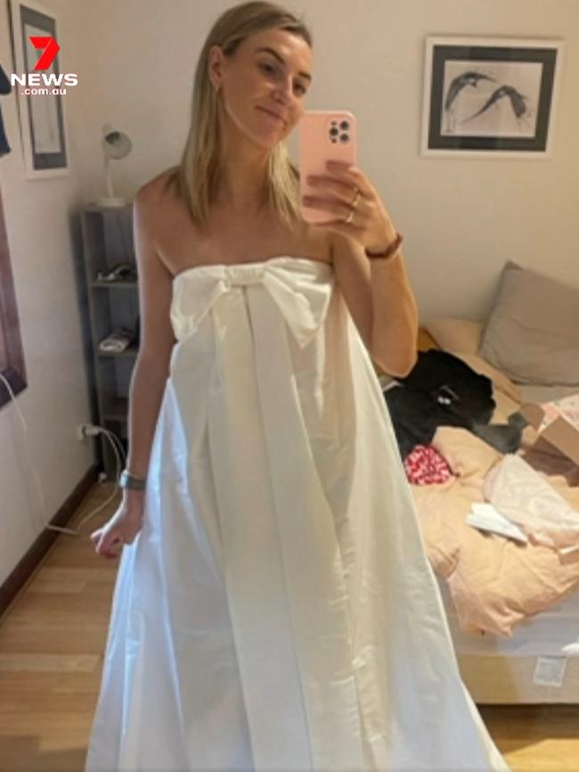 Lindel cain, wearing her wedding dress that was lost after she left on top of her car. Picture: 7News