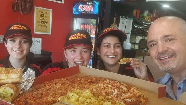 Pizza Bite, with owner Les Hanna (far right) and Mikayla, Indiah and Nisha, was named the region's favourite. Picture: Pizza Bite.