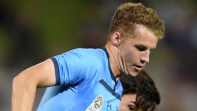 Trent Buhagiar of Sydney is tackled by Dylan Ruiz-Diaz of the Mariners during the Round 10 A-League match between the Sydney FC and the Central Coast Mariners at Netstrata Jubilee Stadium in Sydney, Saturday, December 14, 2019. (AAP Image/Dan Himbrechts) NO ARCHIVING, EDITORIAL USE ONLY