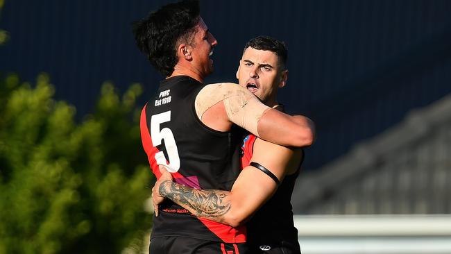 Sunny Brazier and Paul Ahern celebrate a Pascoe Vale win. Picture: Josh Chadwick