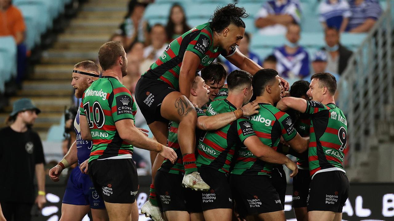 Isaiah Tass (unseen) celebrates a try during round six (Photo by Cameron Spencer/Getty Images)