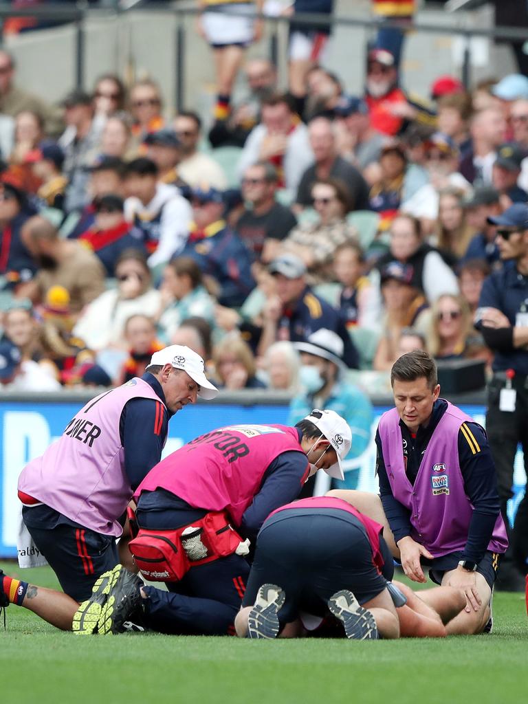 But the acting captain hit the turf hard and was subbed out of the game immediately. Picture: Sarah Reed/AFL Photos