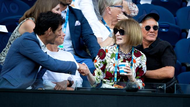 Wintour with racing driver Mark Webber and Baz Luhrmann on Rod Laver Arena. Picture: Fiona Hamilton