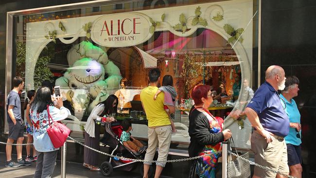 People view the annual Myer Christmas windows display on Bourke Street in 2018. Picture: Getty