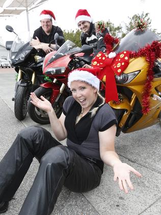 Toy Run riders, from left, Jim Woodward, of Mornington, Steve Mason, of Moonah, and Alyce Fenton, of New Norfolk. Picture: KIM EISZELE