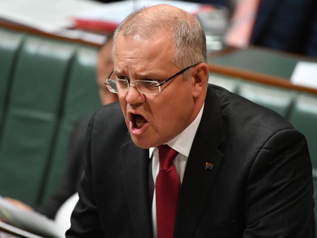 Treasurer Scott Morrison is not backing down, vowing to bring the tax in from July 1. Picture: AAP /Mick Tsikas