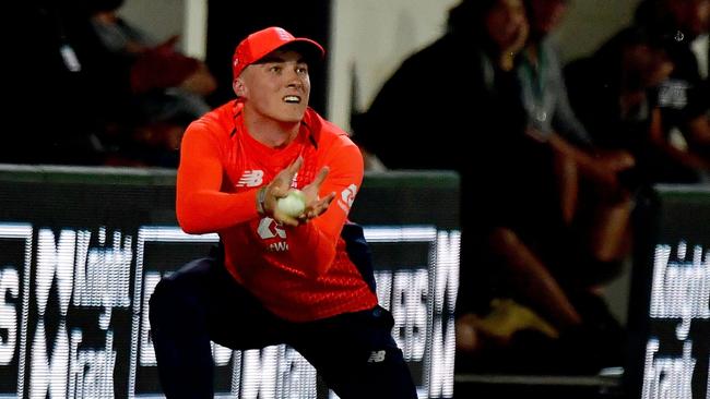 Tom Banton reels in a catch in the field for England during a recent T20 international.