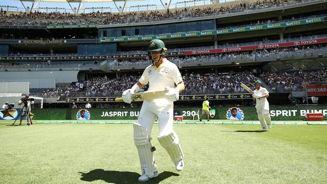 Marcus Harris and Aaron Finch walks out to bat at Perth’s Optus Stadium