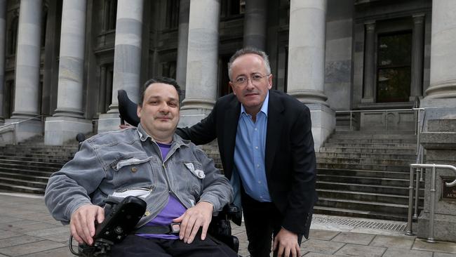 Voluntary euthanasia advocate Andrew Denton and disability spokesman Phillip Beddall. (Pic: Kelly Barnes)