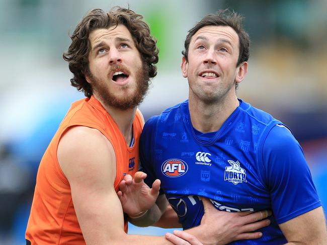 Xerri (left) jostles with Todd Goldstein at North Melbourne training. Picture: Mark Stewart