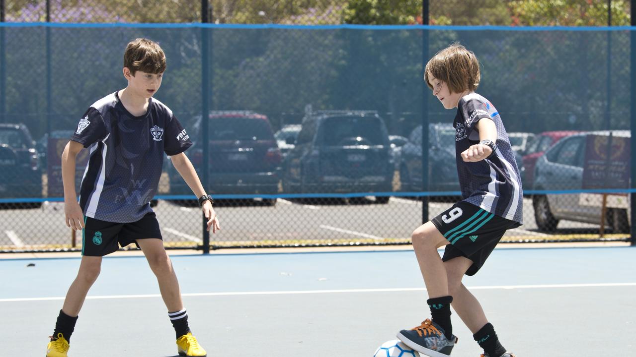 Baxter and Mckenna Hill displaying some of their futsal skills. Picture: Kevin Farmer