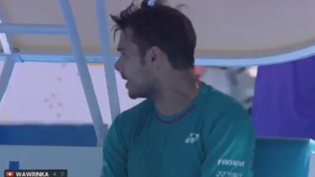 Stan Wawrinka in the midst of a heated discussion in French with Jo-Wilfried Tsonga after the first set of their Australian Open quarter-final.