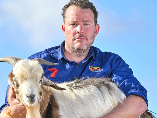 MAY 18, 2024: Andrew 'Cosi' Costello with a feral goat. He is trying to solve the cost of living crisis and damage to the Flinders Ranges by selling cheap goat meat. Picture: Brenton Edwards