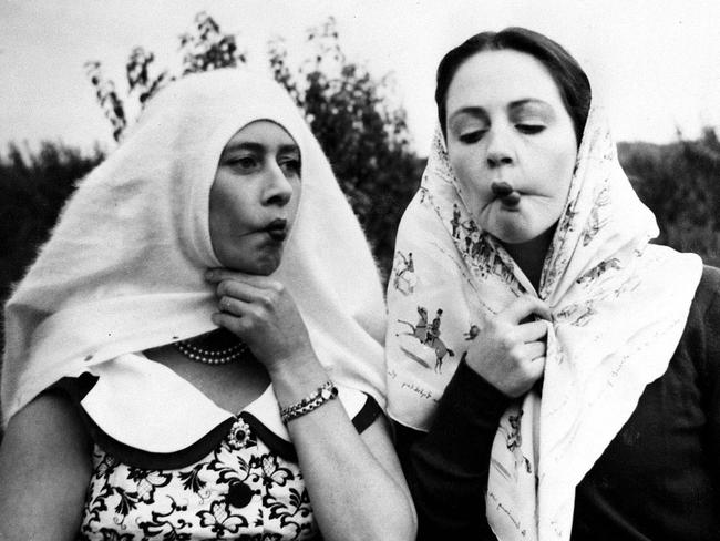 Margaret at left, playing around with a friend in a candid 1957 shot. Picture: Rex/Shutterstock