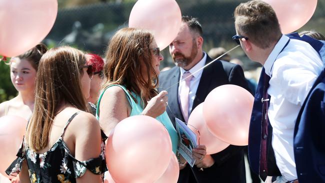 The grieving family of Shelbi Cate Berechree release pink balloons at her funeral. Picture: Nikki Davis-Jones