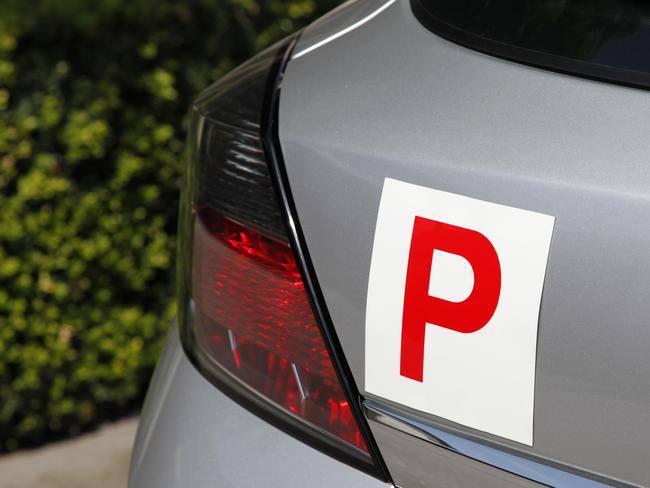 Probationary Plate on a Silver Car