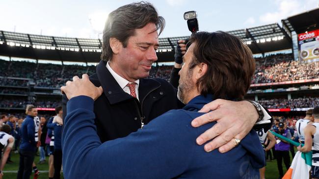 AFL chief executive Gillon McLachlan, left, with Geelong coach Chris Scott. Picture: Getty Images