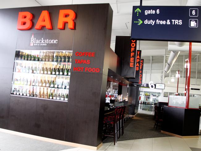 Photos are of a Restaurant at the Coolangatta Airport called the Blackstone Bar and Lounge.  Photos are of the restaurants location in Coolangatta Airport.  L-R in photos is Chef Matteo and food dishes are the Eggs Benedict, the Calamari Salad and the Chorizo with Tomato Chutney.