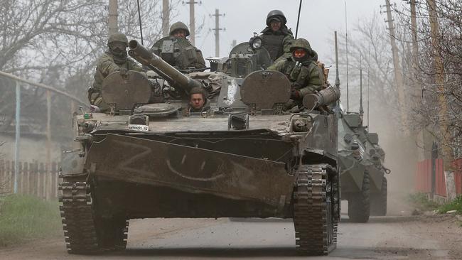 An armoured column of pro-Russian separatist troops on the move near Mariupol on Sunday. Picture: Reuters