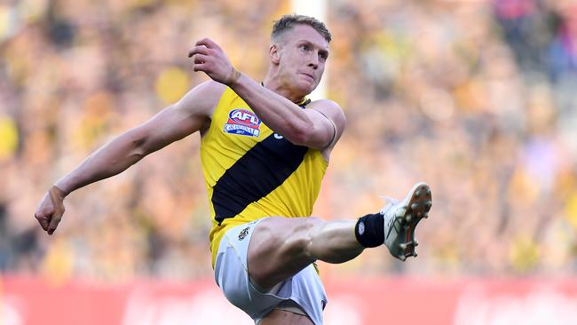 Josh Caddy of the Tigers is seen in action during the AFL grand final between the Adelaide Crows and Richmond Tigers at the MCG in Melbourne, Saturday, September 30, 2017. (AAP Image/Julian Smith) NO ARCHIVING, EDITORIAL USE ONLY