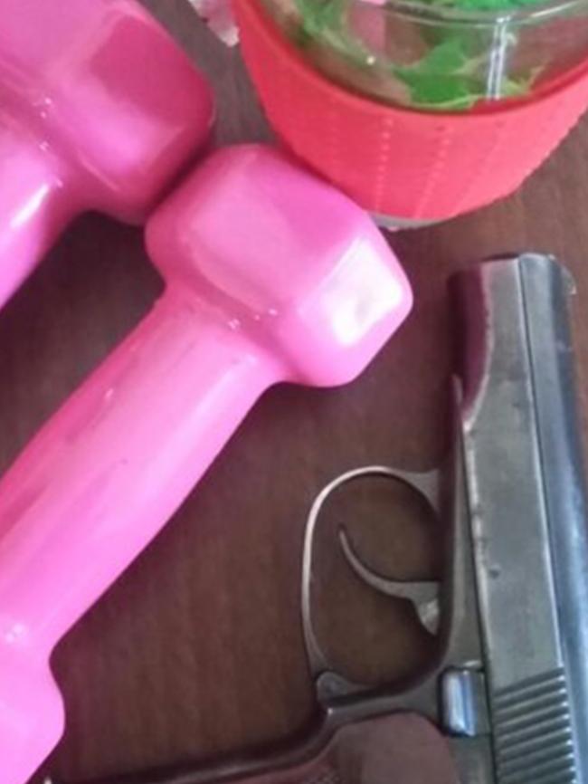 A picture of dumbbells with a pistol, from the Telegram account of Shadi Jabar.