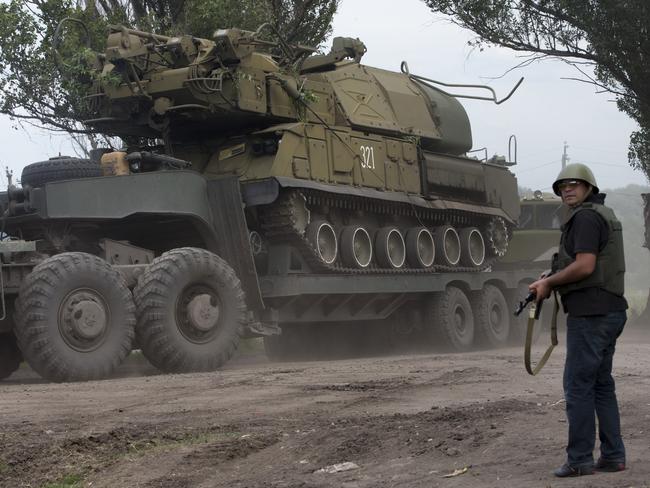 Ukrainian government forces manoeuvre a Buk anti-aircraft missile launcher. Picture: AP / Dmitry Lovetsky