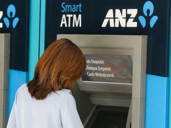 SYDNEY, AUSTRALIA - NewsWire Photos - NOVEMBER 11 2020: A view of young women using an ANZ Bank ATM in the CBD in Sydney Australia. Picture: NCA NewsWire / Gaye Gerard