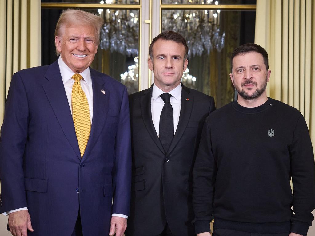 Mr Trump and Mr Zelensky with French President Emmanuel Macron. Picture: AFP Photo/Ukrainian Presidential Press Service