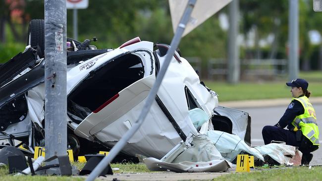 Police inspect the scene of a fatal crash where four children were killed early Sunday morning. PICTURE: MATT TAYLOR