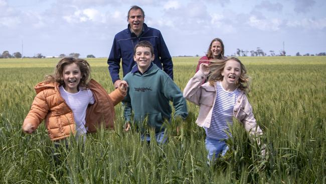 South Australian grain farmers Bradley and Colleen Lowe with kids Ethan, Macy and Josie at Wasleys, SA. Picture Emma Brasier