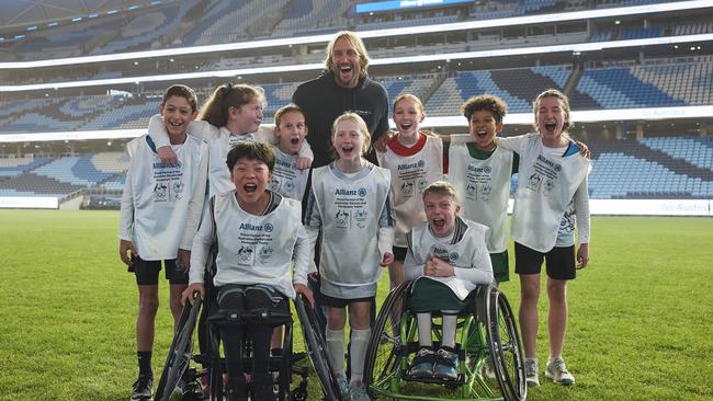 Young grassroots teams met Olympic bronze medallist surfer Owen Wright as part of the initiative. Picture: Supplied