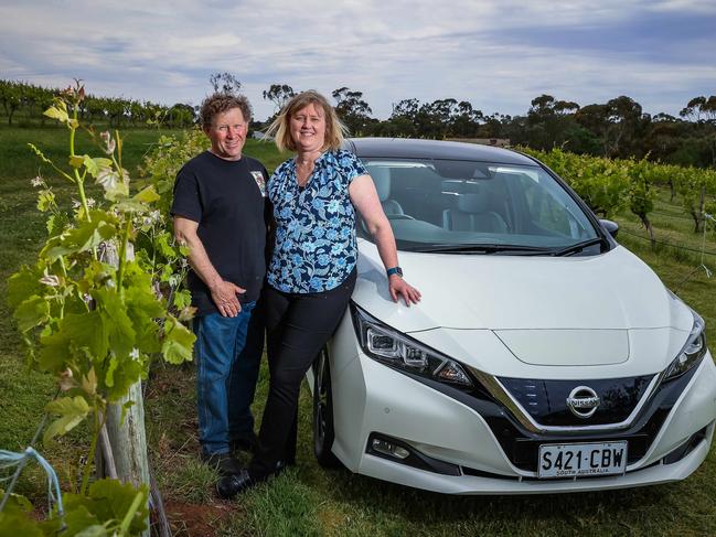 Winery owner Joseph Evans has been waiting to hook his Nissan Leaf up to his home for two years, pictured with wife Sue and dog Tama, at Ballycroft Vineyard and Cellars in Greenock.Picture: Tom Huntley