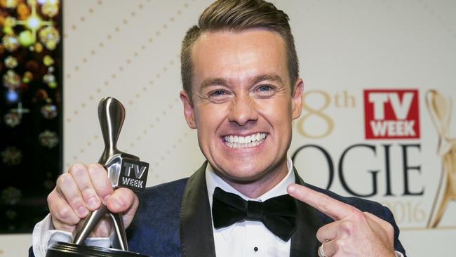 Grant Denyer and his life-size Logie. Picture: Media Mode